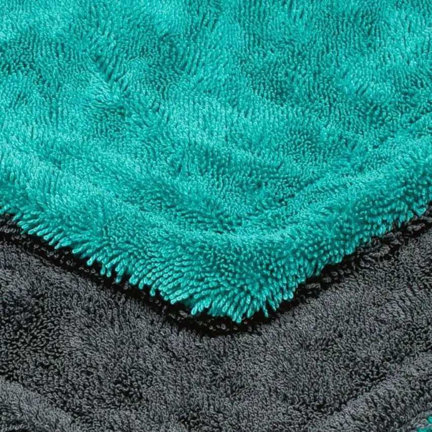 Close-up of twisted-loop pile on Motohomies 1200 GSM microfiber cloth, aqua and grey sides