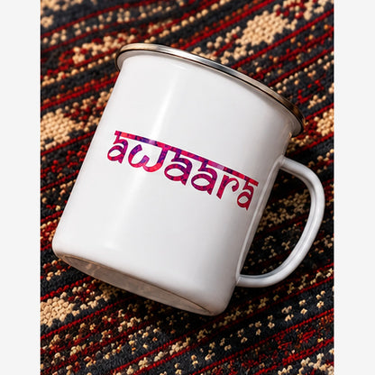 Awaara white enamel mug angled on a patterned touring rug