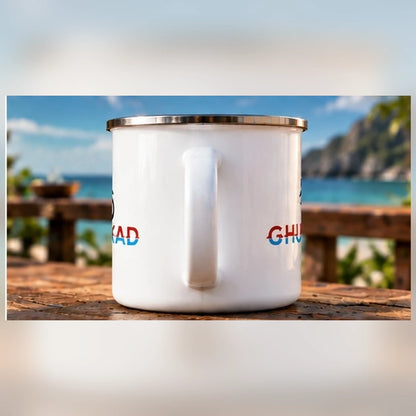 Reverse angle of GHUMAKKAD enamel mug showing handle and double-sided print at the beach cafe