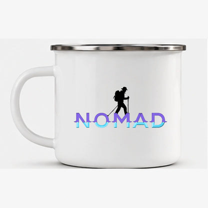Front studio view of white Nomad enamel mug with black trekking silhouette and violet turquoise NOMAD lettering