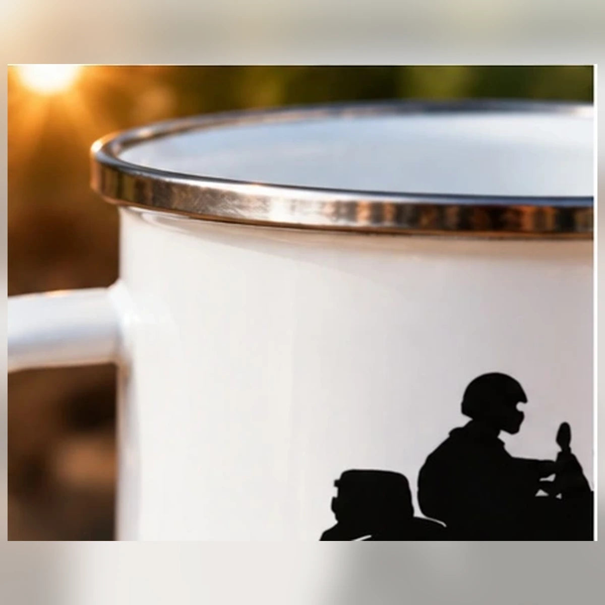 Close-up of stainless steel rim and premium printed surface on GHUMAKKAD enamel camping mug