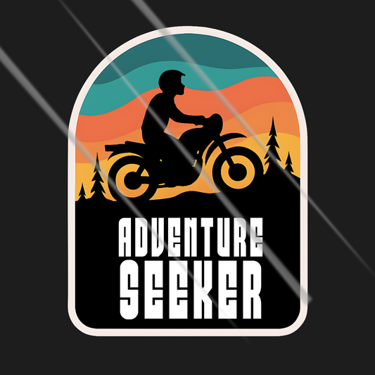 Sticker design with a silhouette of a person on a motorcycle against a sunset landscape, with 'Adventure Seeker' text.