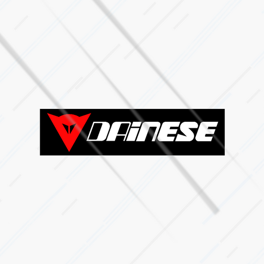 Dainese logo sticker on a white background with black and red design
