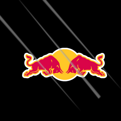 Red Bull logo sticker on a black background with diagonal lines