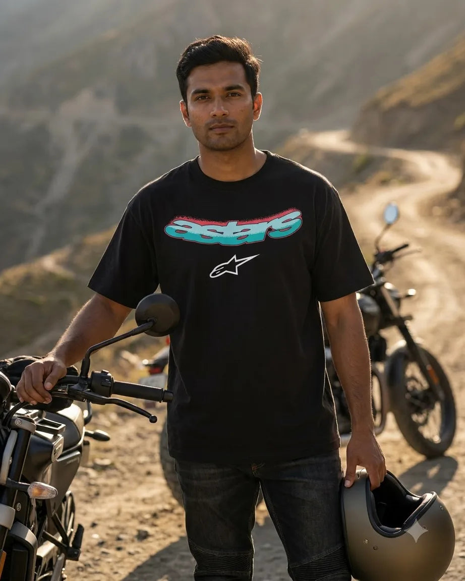 Alpinestars graphic black regular T-shirt worn by a rider