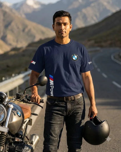 BMW M Power navy T-shirt worn beside a motorcycle on a mountain road