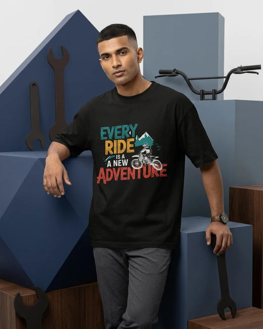 Every Ride Is A New Adventure black oversized t-shirt on male model with dirtbike rider graphic