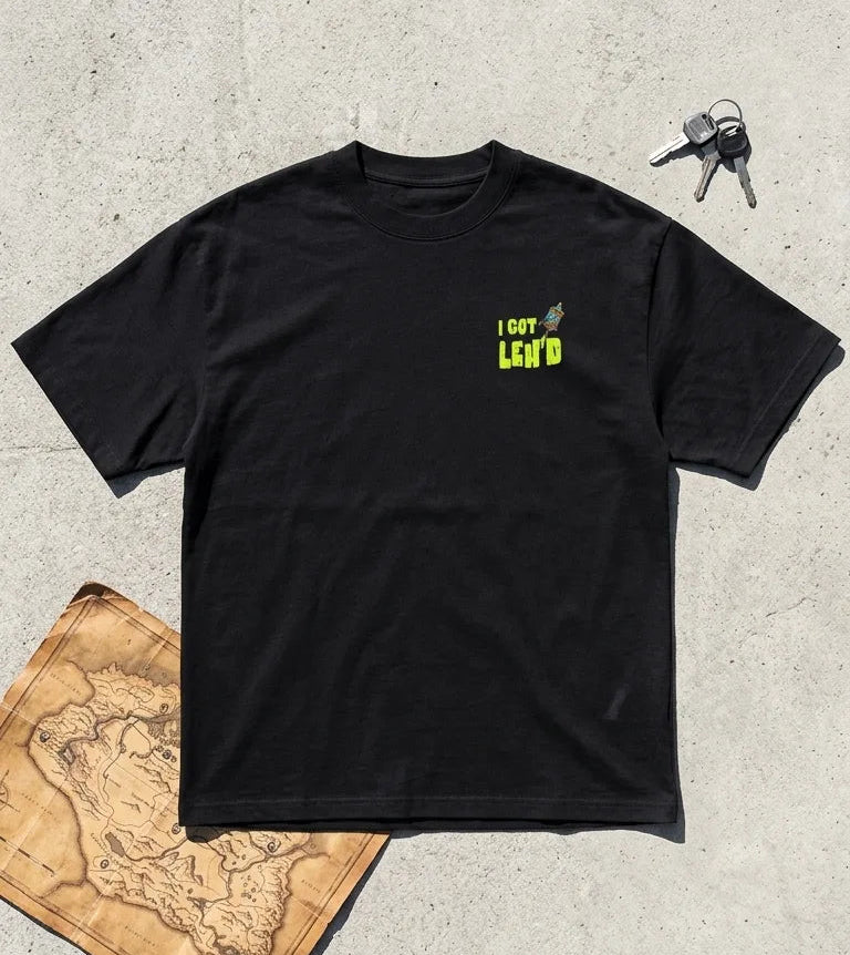 I Got Leh'd oversized t-shirt black flat lay with neon green chest print and Mani prayer wheel