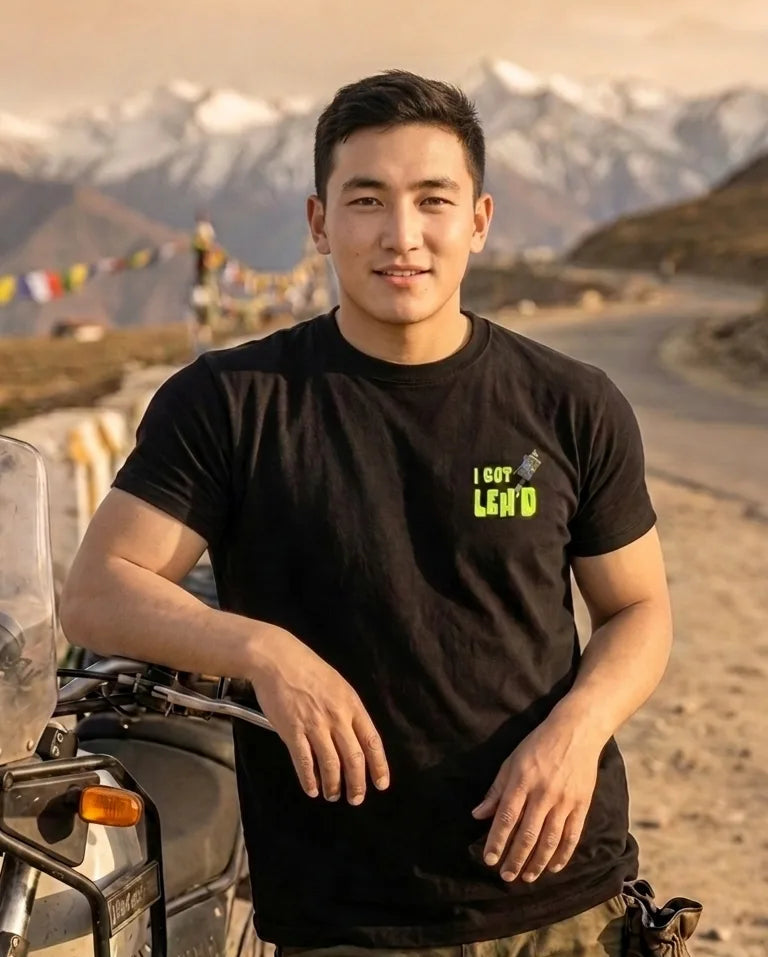 I Got Leh'd oversized t-shirt with neon green chest print on rider with Royal Enfield Himalayan
