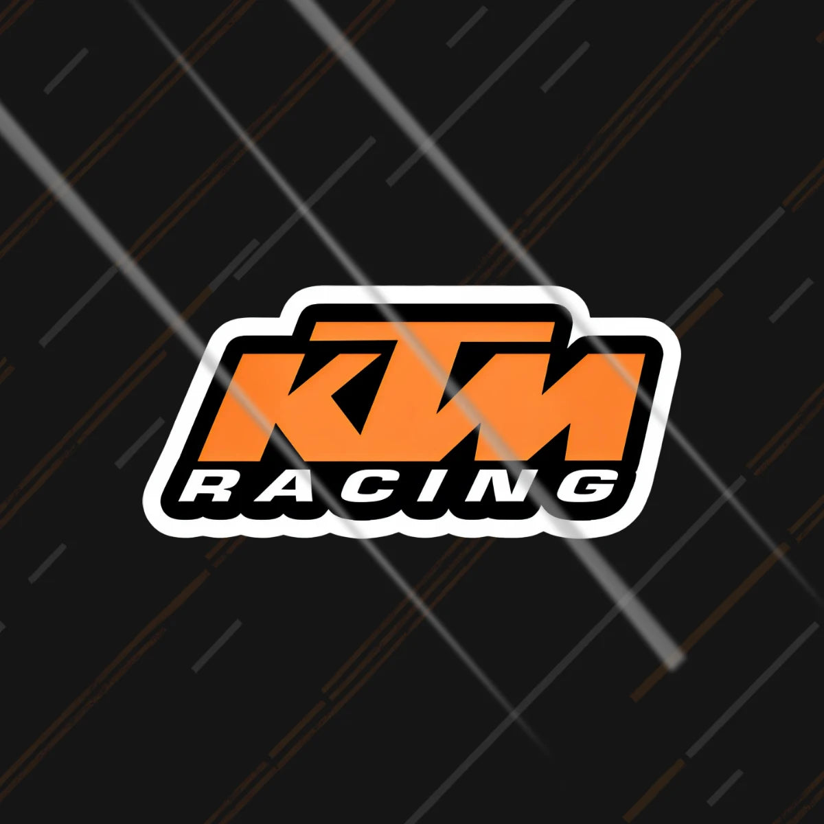 KTM Racing reflective sticker 3 inch glowing under headlights at night