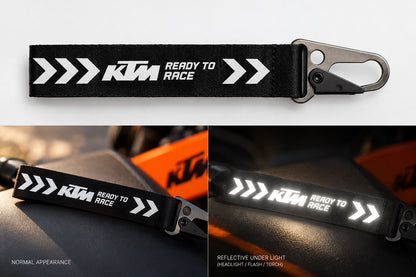 KTM reflective keychain normal appearance compared with reflective white print under flash