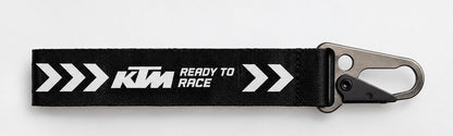 KTM Ready To Race reflective bike keychain black woven fabric with racing arrows and metal clasp