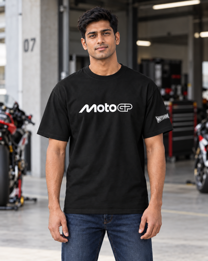 Front view of the black MotoGP oversized T-shirt with white chest logo and Motohomies sleeve branding