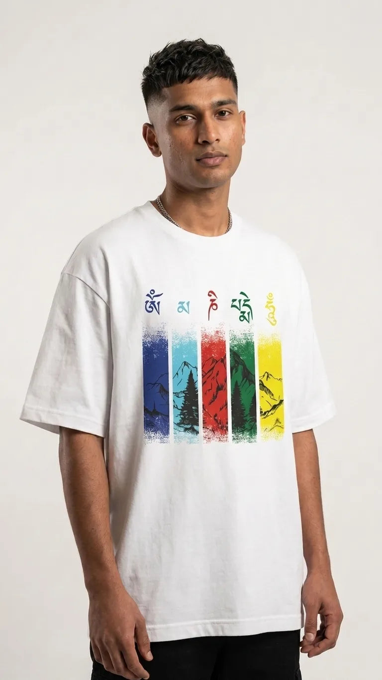 Om Mani Padme Hum white oversized t-shirt on male model showing Lungta colour panels and mountain design