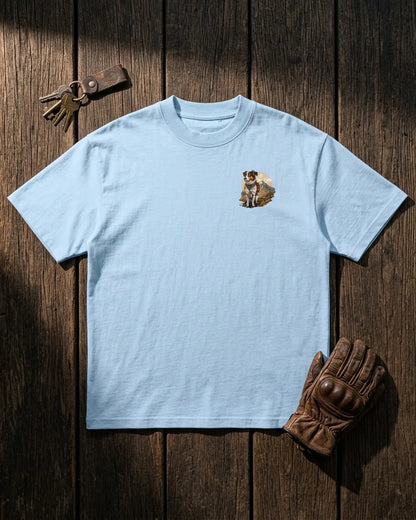 Pahadi Dogs blue oversized t-shirt front chest logo flat lay with riding gloves and keys
