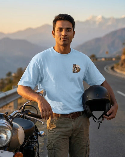 Pahadi Dogs blue oversized t-shirt front chest logo on rider with motorcycle and Himalayas